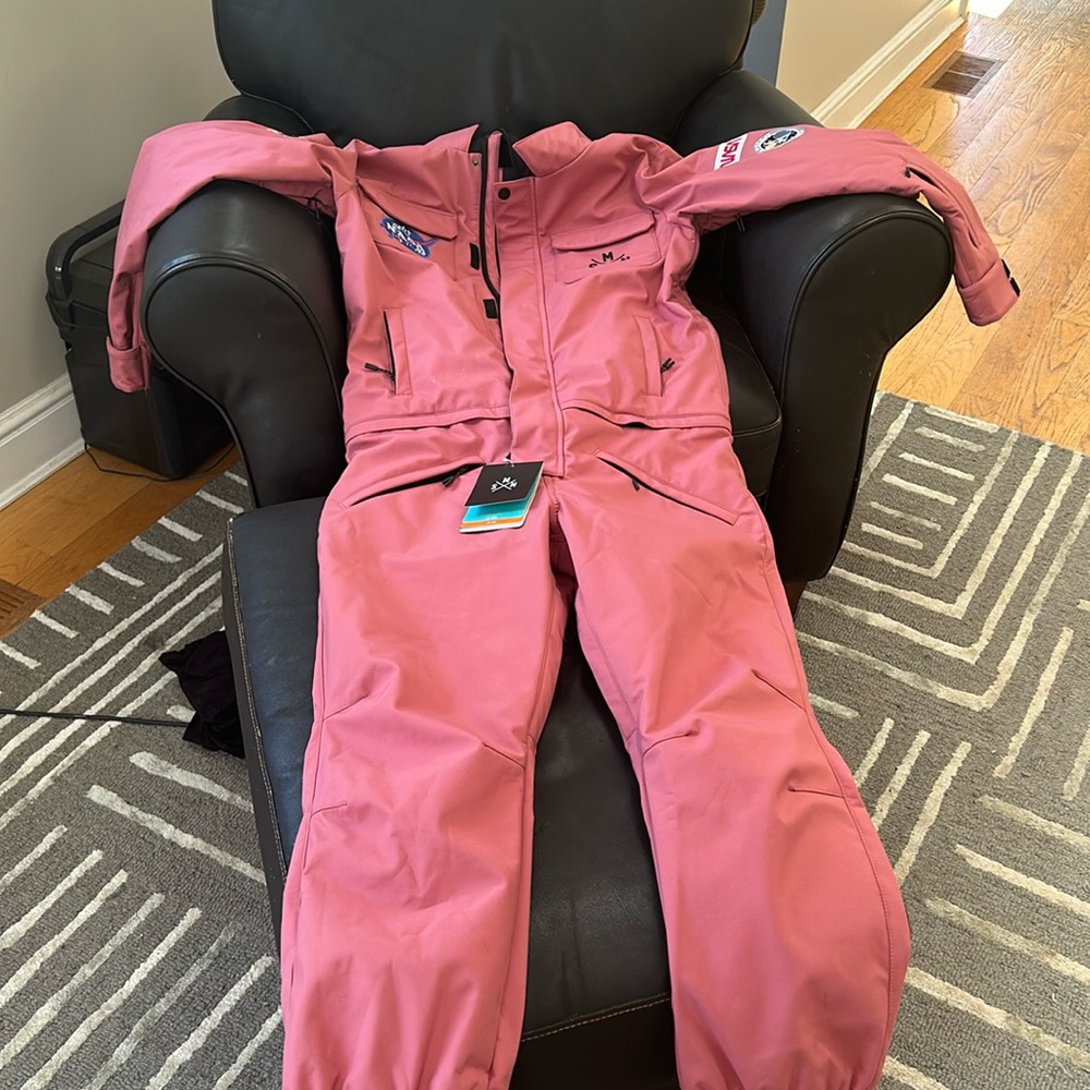 Snowverb one piece snow suit never used.